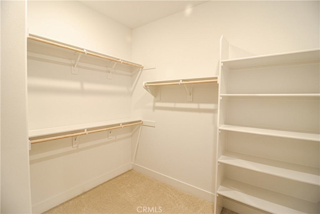 635 Gadwall Irvine, CA 92618 - Photo 20 of 27 a view of an empty walk in closet