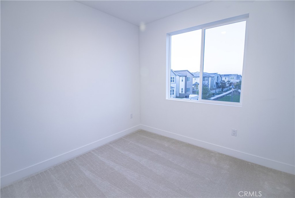635 Gadwall Irvine, CA 92618 - Photo 26 of 27 an empty room with a window