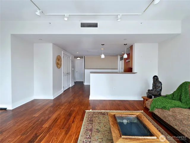 a spacious bathroom with a sink a toilet and shower