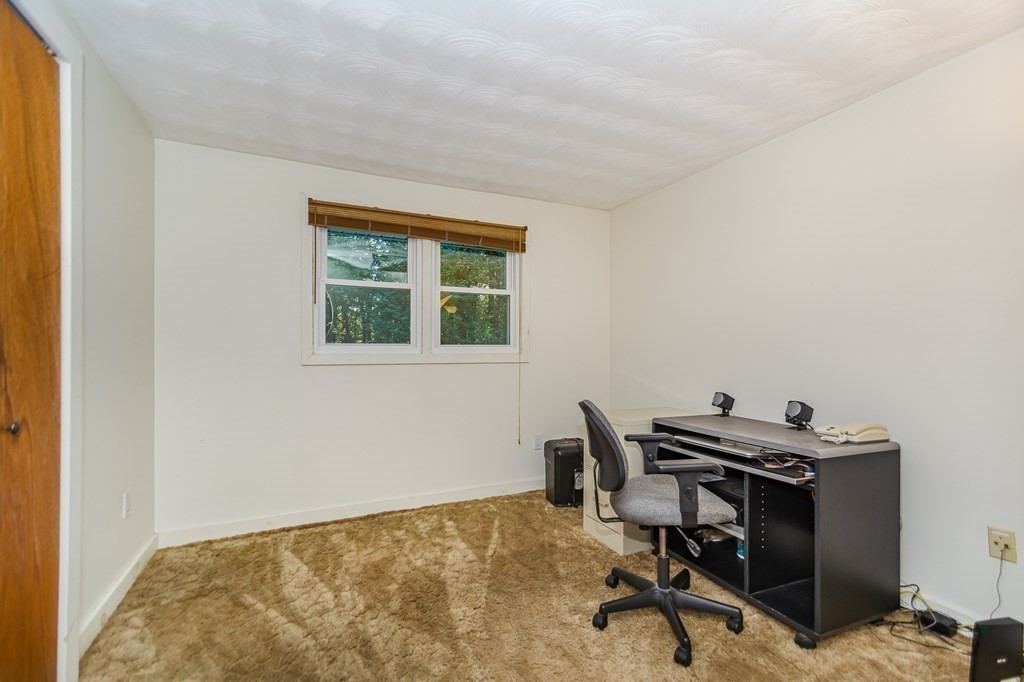 7 Ruthellen Road Chelmsford, MA 01824 - Photo 27 of 40 a view of a workspace with furniture and a window