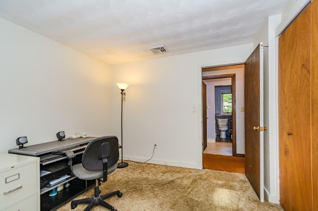 7 Ruthellen Road Chelmsford, MA 01824 - Photo 28 of 40 a view of a workspace with furniture and a window