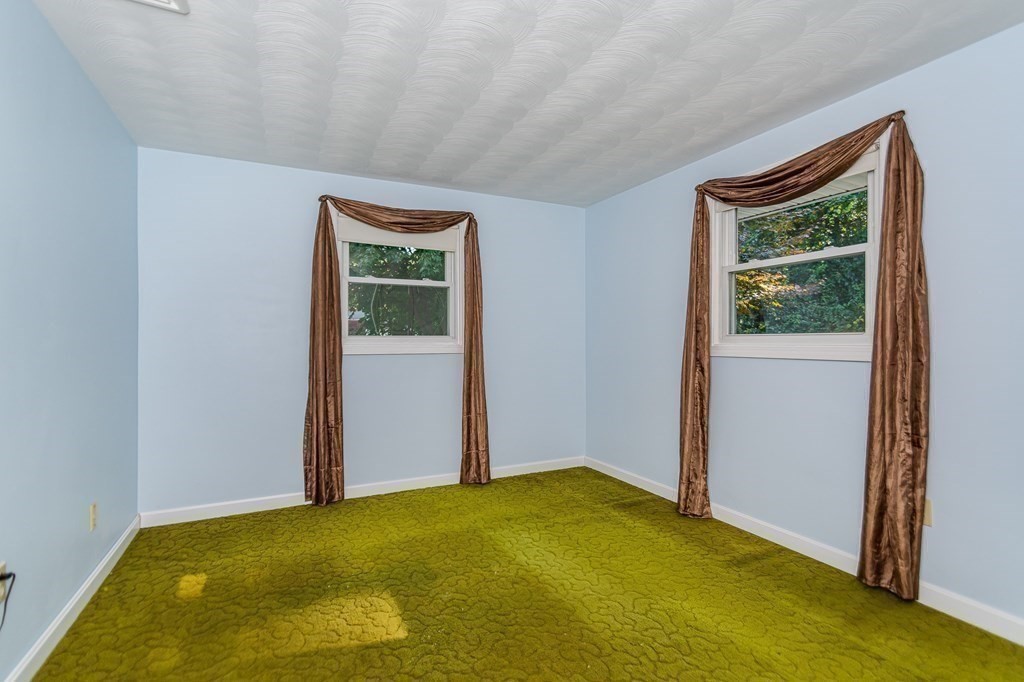 7 Ruthellen Road Chelmsford, MA 01824 - Photo 29 of 40 a view of an empty room with a window