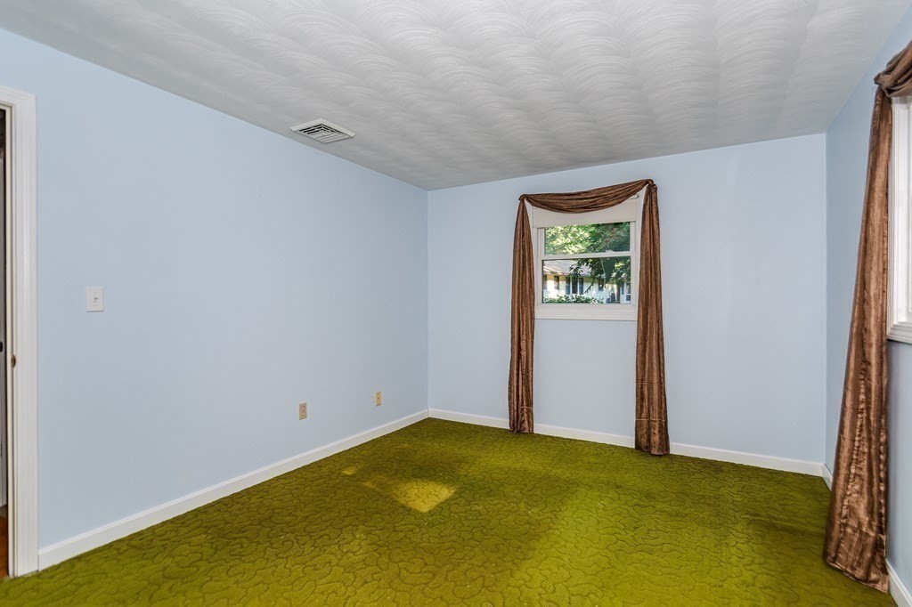7 Ruthellen Road Chelmsford, MA 01824 - Photo 30 of 40 an empty room with windows