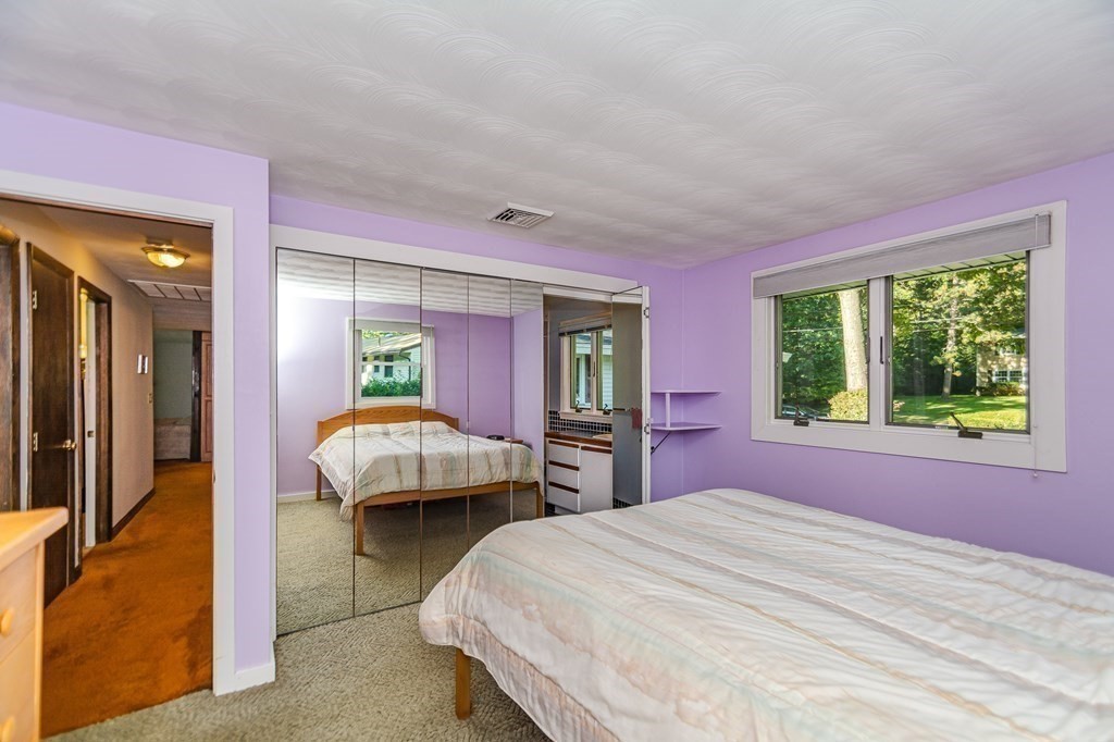 7 Ruthellen Road Chelmsford, MA 01824 - Photo 35 of 40 a bedroom with a bed and a window