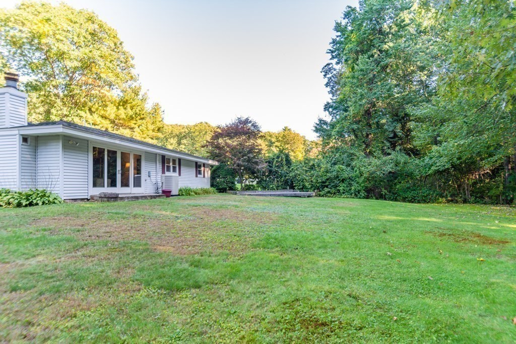 7 Ruthellen Road Chelmsford, MA 01824 - Photo 5 of 40 a view of a house with a yard