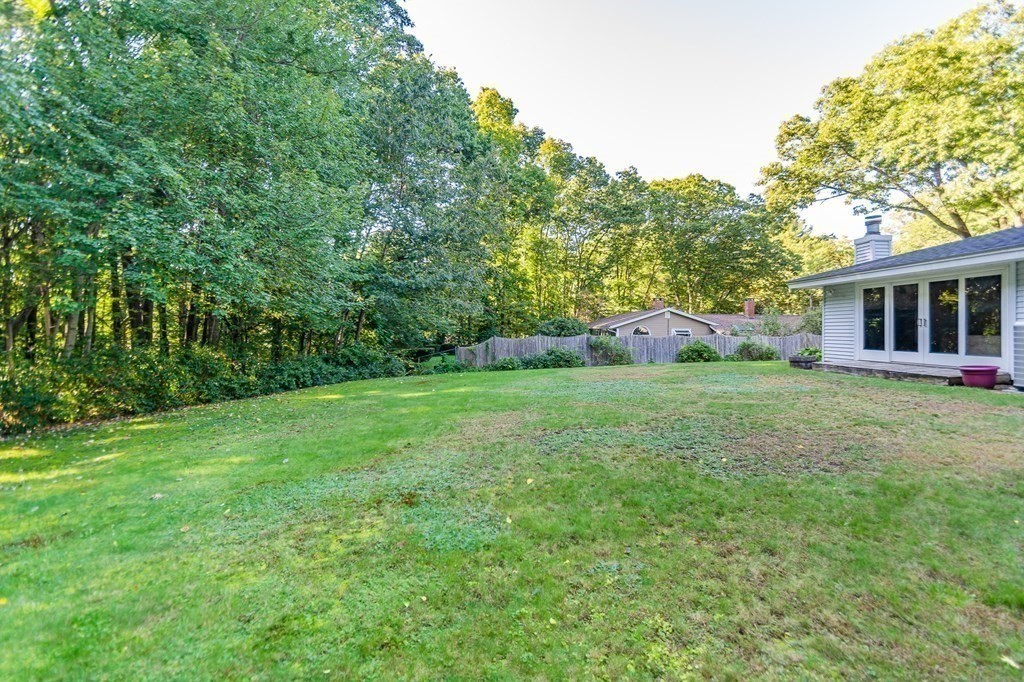 7 Ruthellen Road Chelmsford, MA 01824 - Photo 7 of 40 a view of a house with backyard and garden