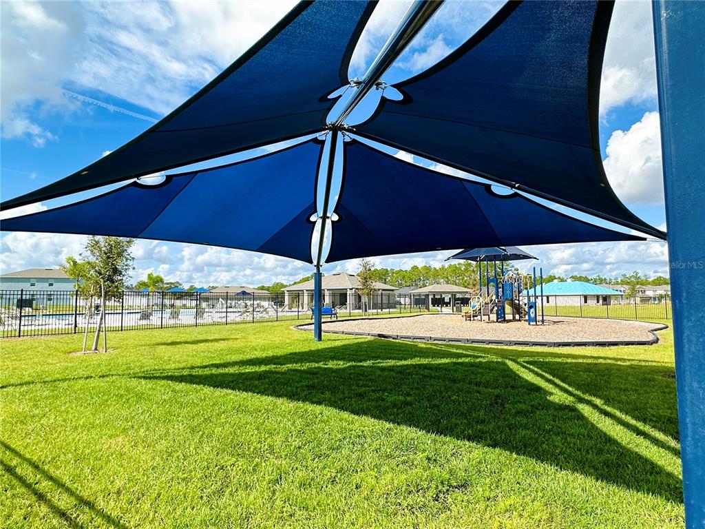 700 Daring Drive Davenport, FL 33837 - Photo 21 of 22 a view of a big room with a big yard