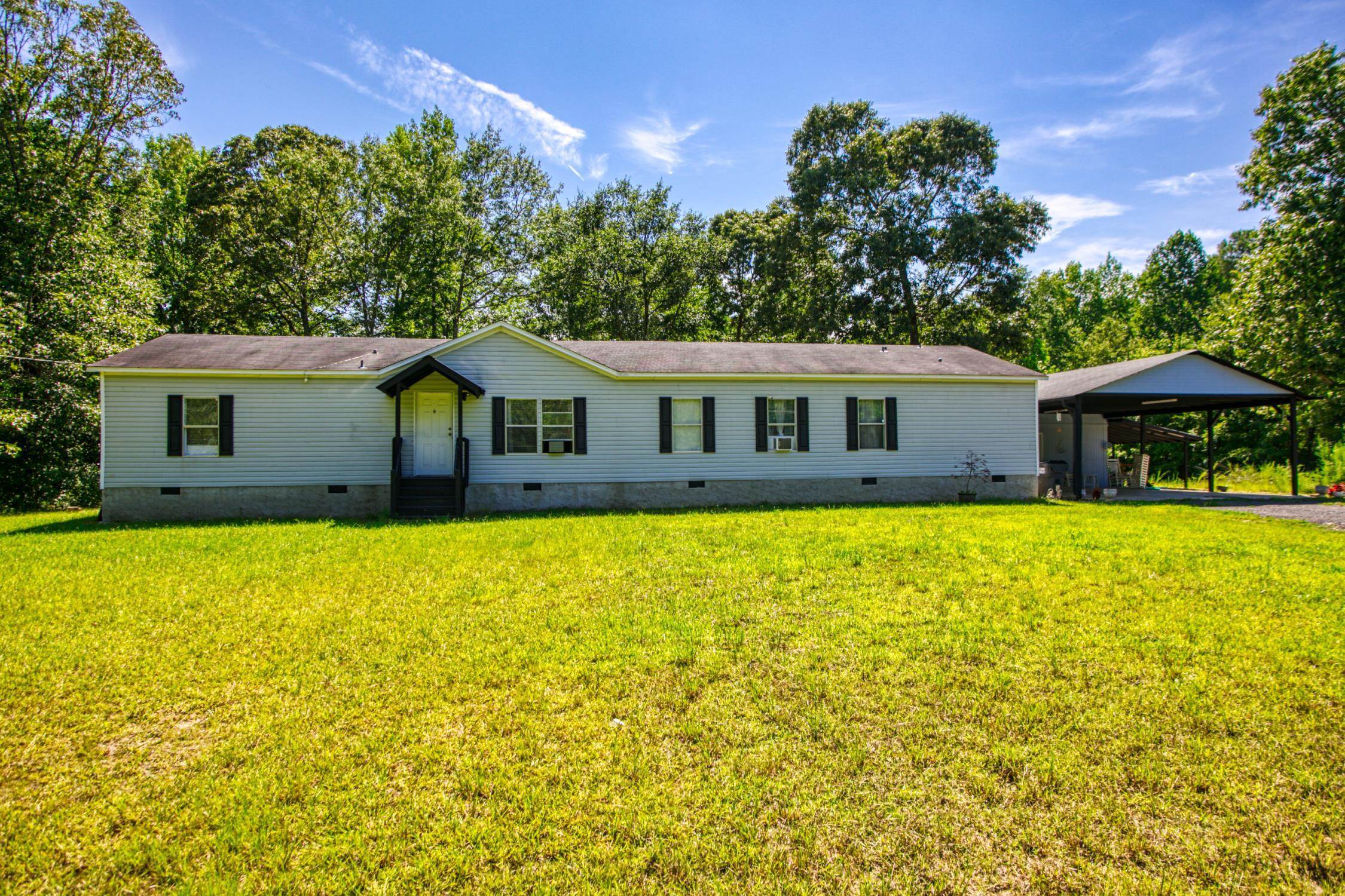 925 Agan Road Bremen, GA 30110 - Photo 1 of 1 a front view of a house with swimming pool