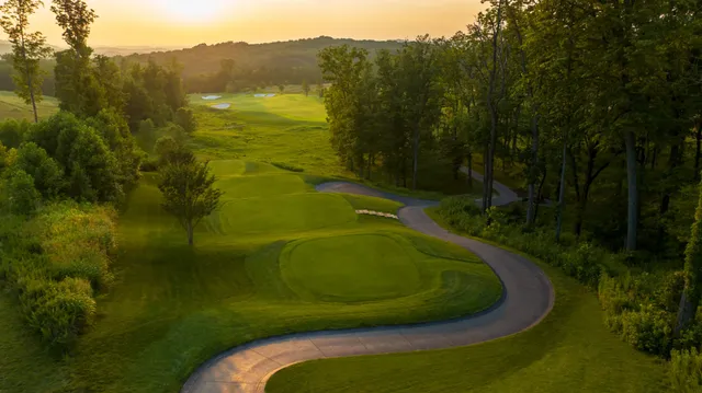 a view of a golf course with a swimming pool