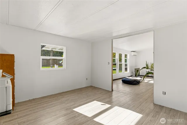 a view of livingroom with furniture and wooden floor