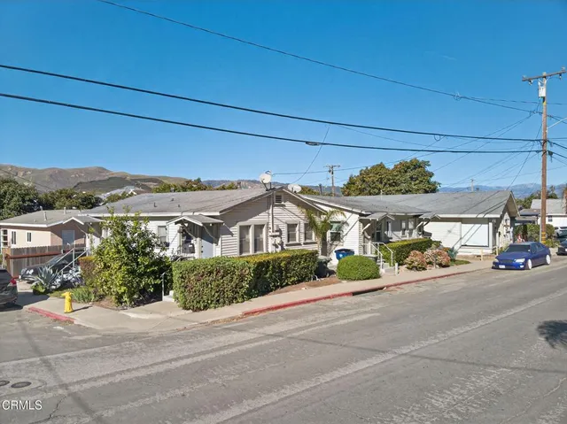 front view of a house with a street