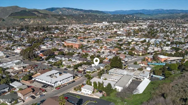 an aerial view of residential house with outdoor space