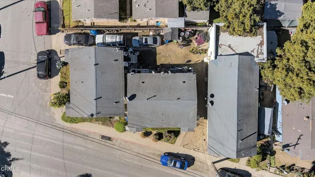 an aerial view of a house with outdoor space