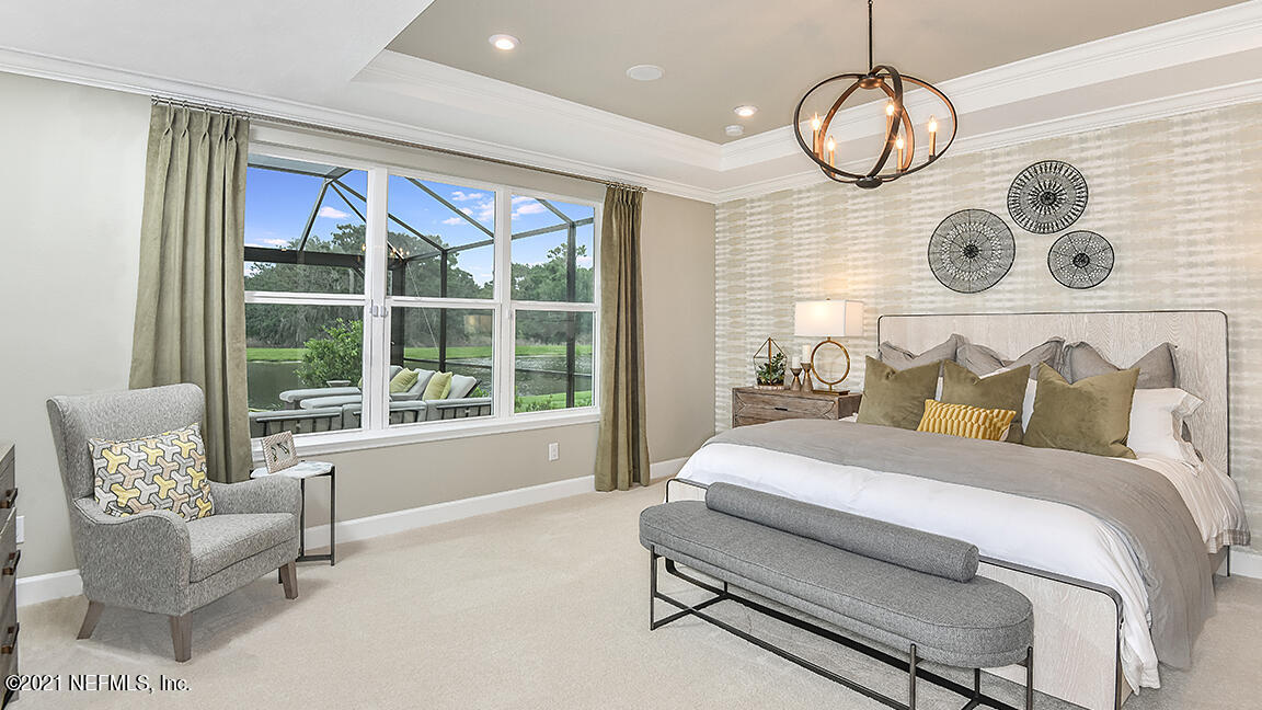 518 Marquesa Circle St. Johns, FL 32259 - Photo 11 of 27 a spacious bedroom with a bed and window