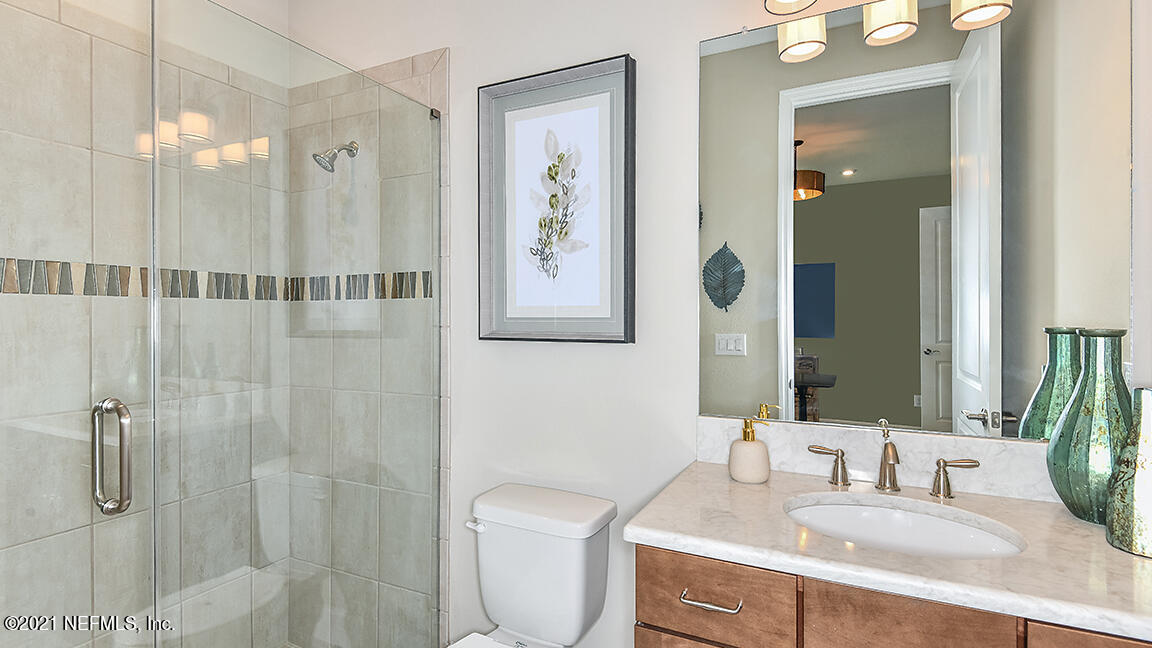 518 Marquesa Circle St. Johns, FL 32259 - Photo 17 of 27 a bathroom with a sink a toilet and shower