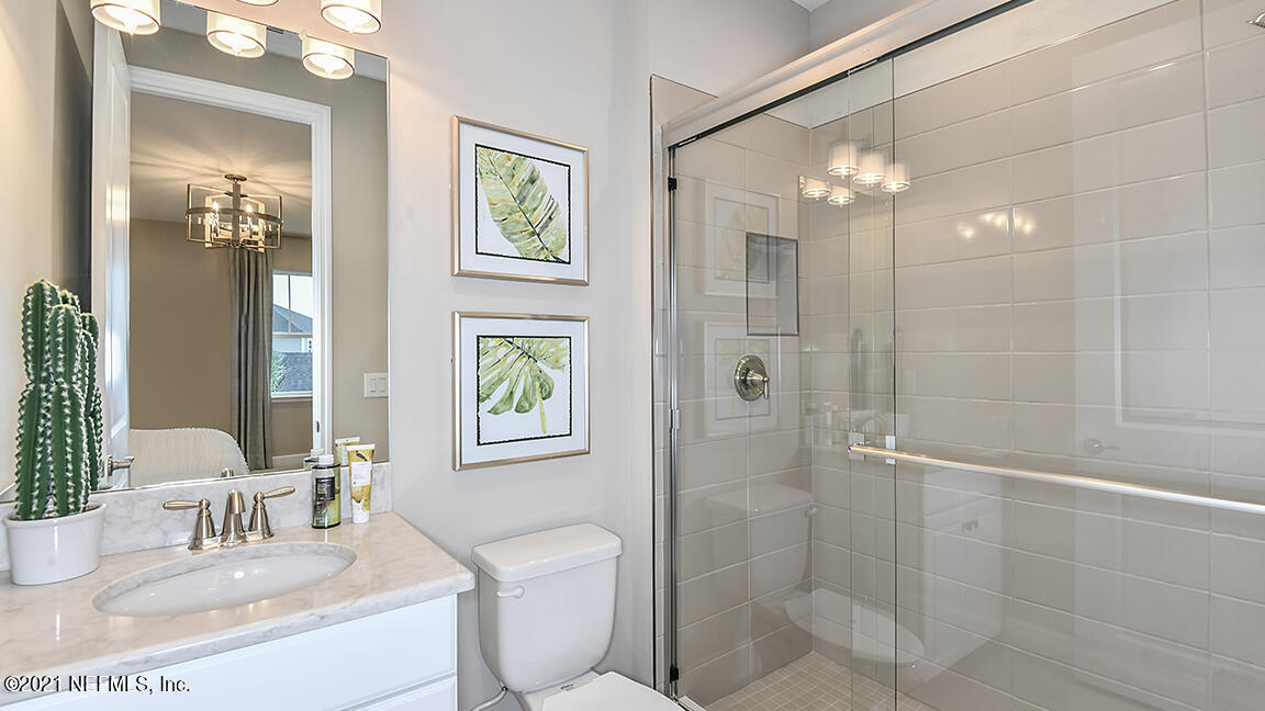 518 Marquesa Circle St. Johns, FL 32259 - Photo 20 of 27 a bathroom with a toilet a sink and shower
