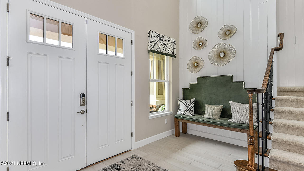 518 Marquesa Circle St. Johns, FL 32259 - Photo 2 of 27 a bedroom with furniture and a window