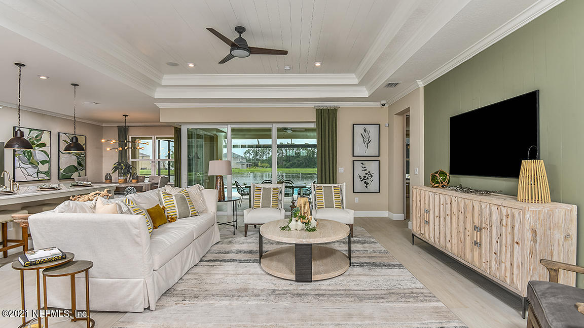 518 Marquesa Circle St. Johns, FL 32259 - Photo 5 of 27 a living room with furniture and a flat screen tv