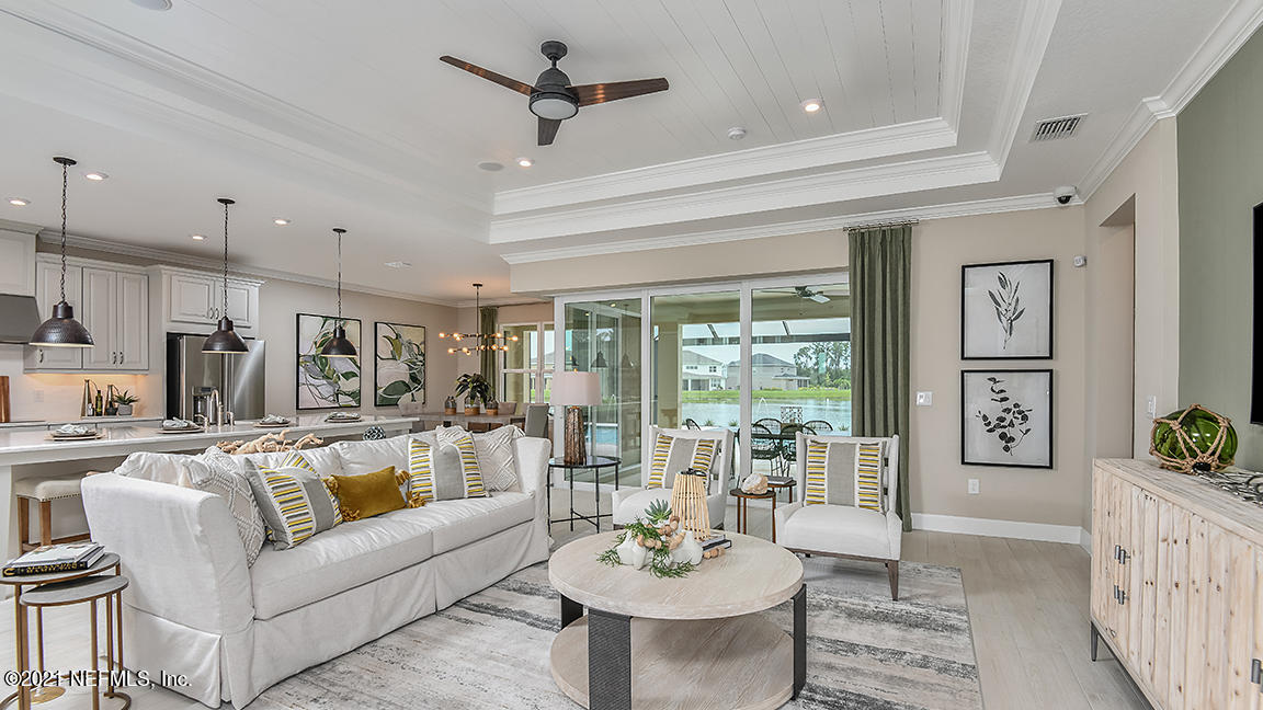 518 Marquesa Circle St. Johns, FL 32259 - Photo 6 of 27 a living room with furniture and a large window