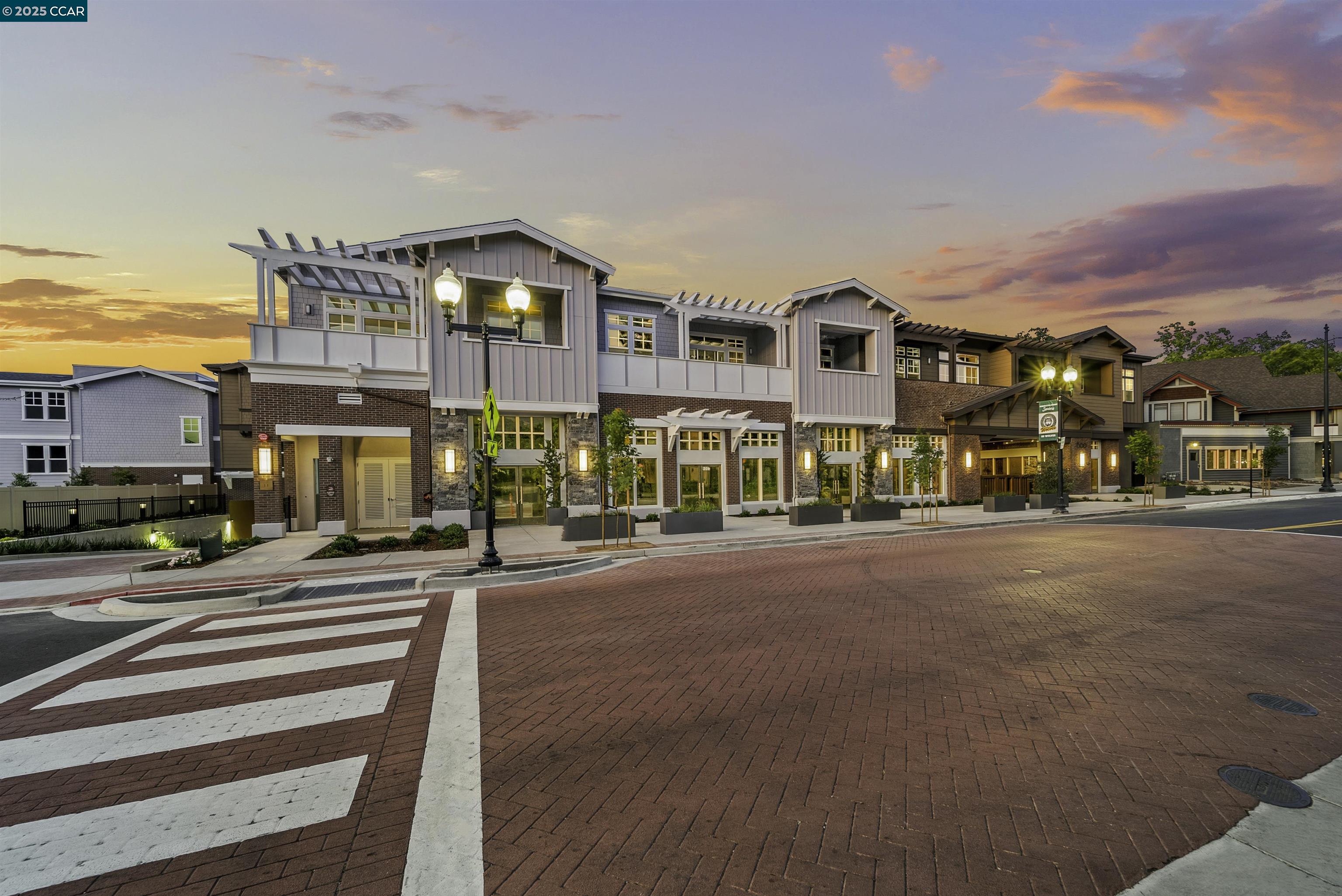 a front view of a building with street view
