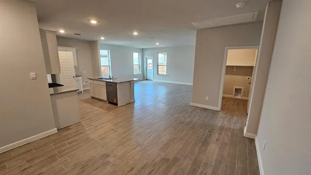 an empty room with windows