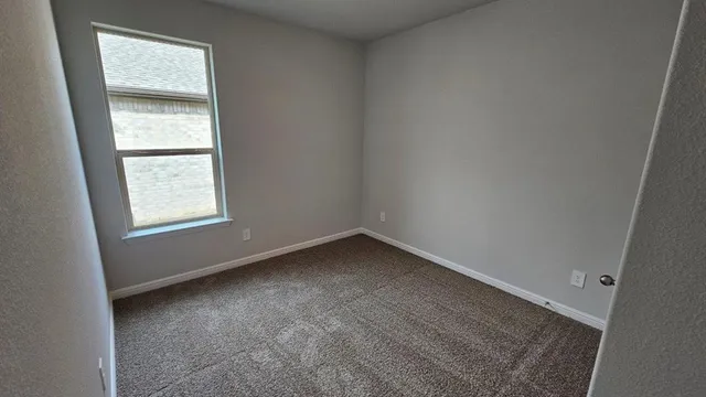 a bathroom with a double vanity sink and mirror