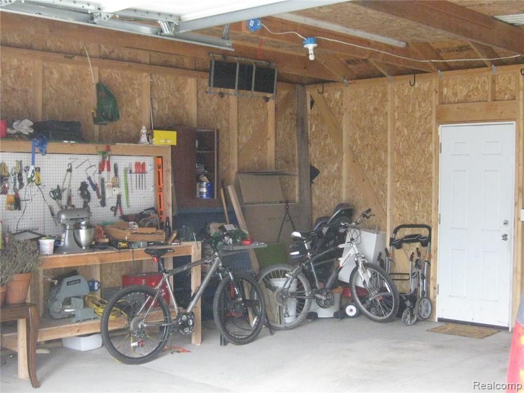 676 North Conklin Road Lake Orion, MI 48362 - Photo 35 of 39 Large 2.5 car garage provides plenty of storage & work space