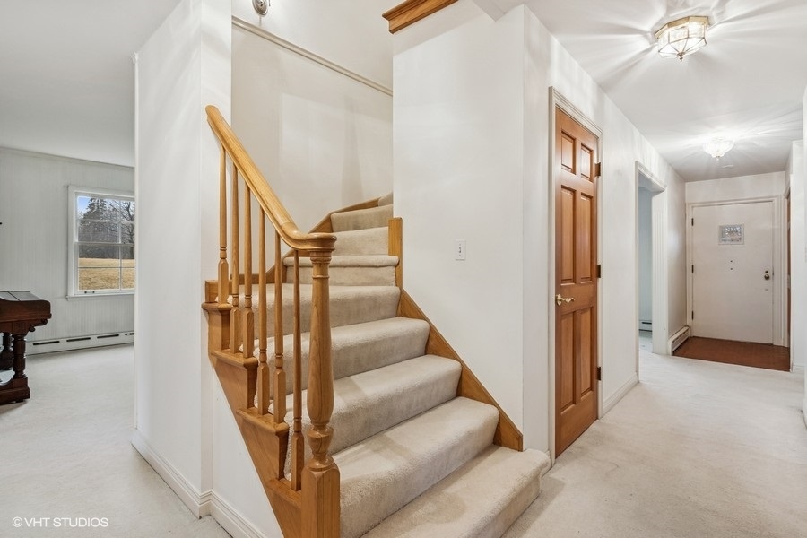 725 Milton Road Inverness, IL 60067 - Photo 2 of 24 a view of entryway and hall with wooden floor