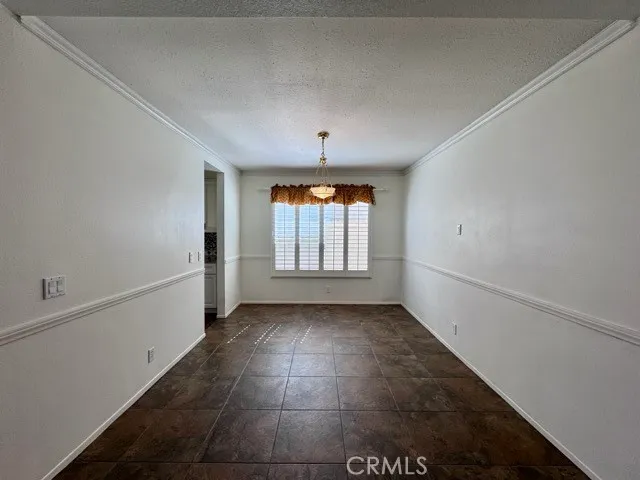 a kitchen with a stove and a sink