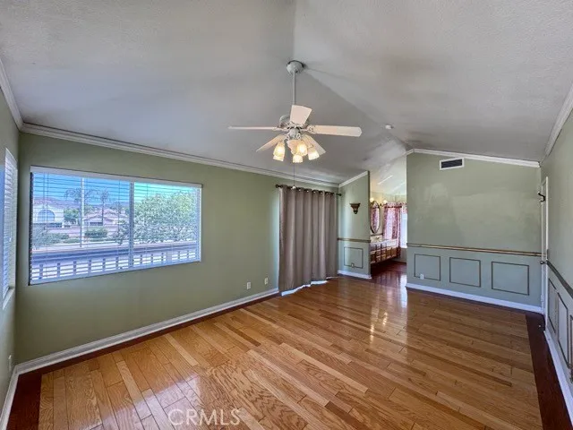 a view of an empty room with a staircase