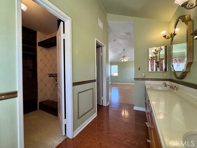 a view of a balcony with wooden floor and city view