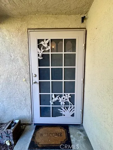 a view of an empty room with stairs