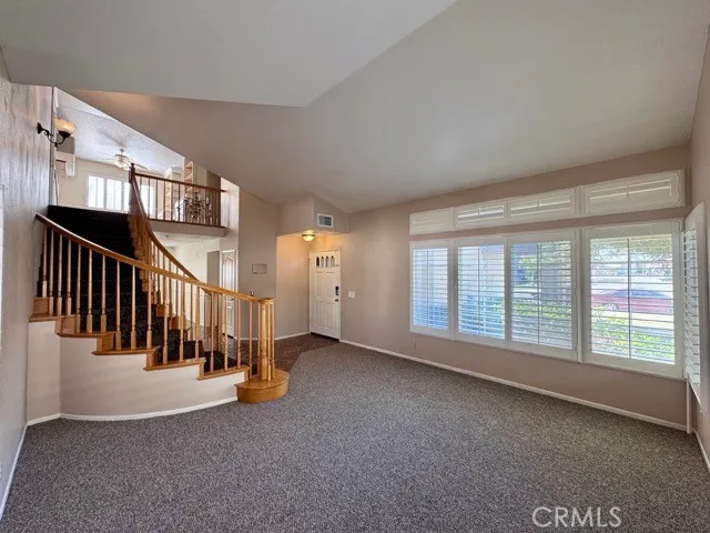 a view of a livingroom with a staircase