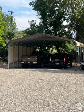 367 East Rio Grande Avenue Marysvale, UT 84750 - Photo 13 of 34 View of vehicle parking featuring a carport and gravel driveway
