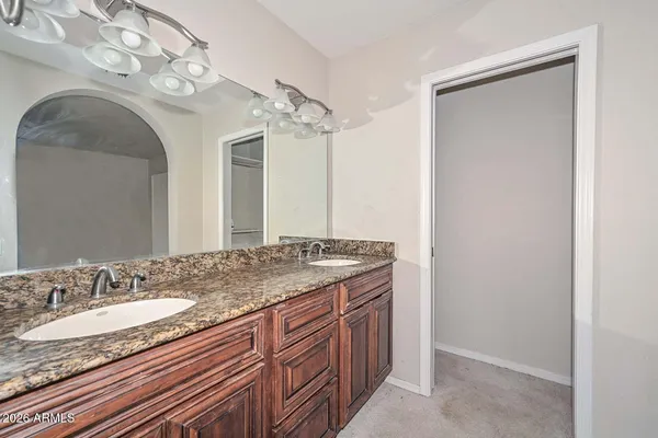a view of empty room with ceiling fan