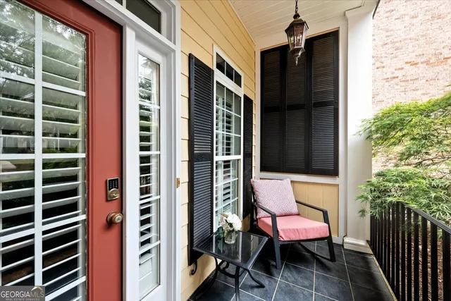 a outdoor view of a house with outdoor seating