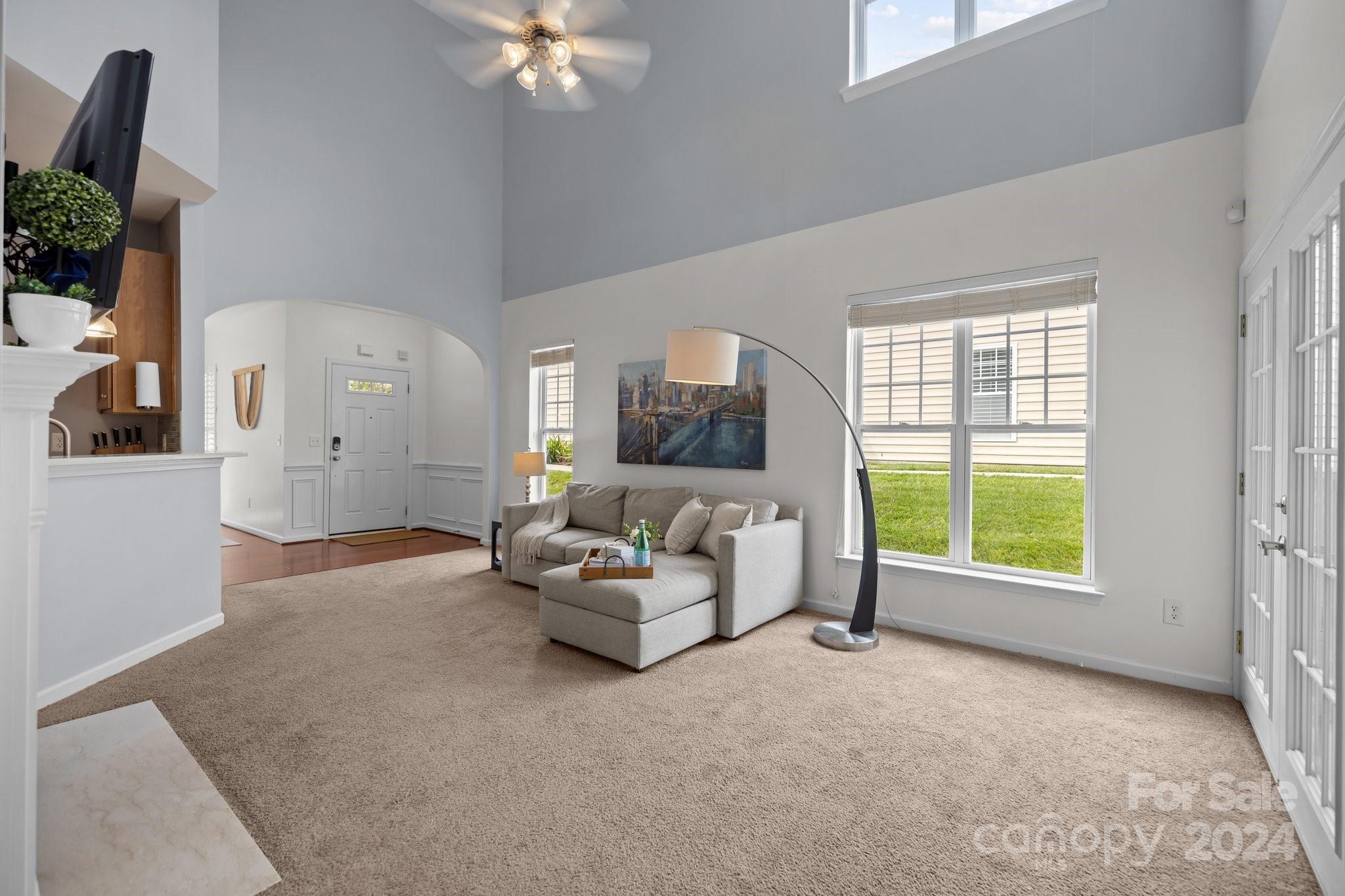 449 Silver Cypress Lane Fort Mill, SC 29708 - Photo 14 of 42 a living room with furniture and a large window