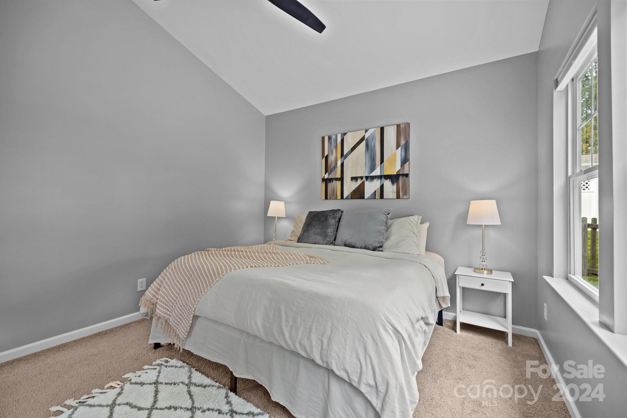 449 Silver Cypress Lane Fort Mill, SC 29708 - Photo 17 of 42 a bedroom with a bed and a window