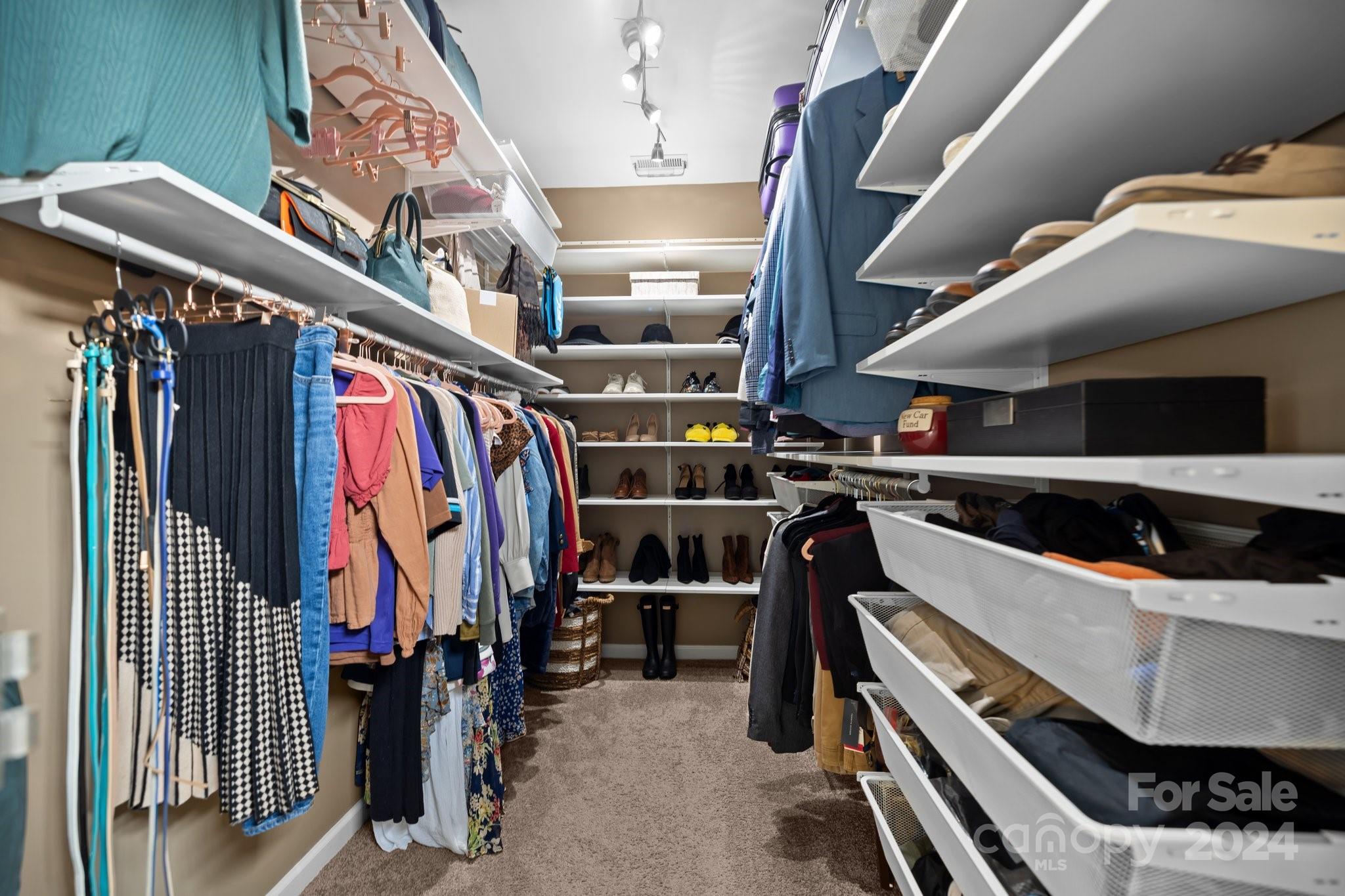 449 Silver Cypress Lane Fort Mill, SC 29708 - Photo 18 of 42 a view of walk in closet with clothes