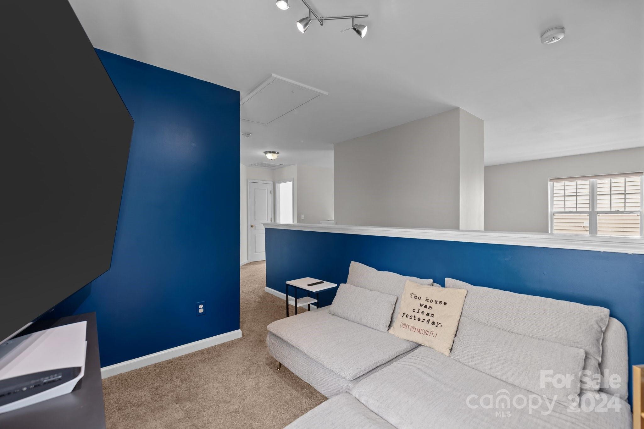 449 Silver Cypress Lane Fort Mill, SC 29708 - Photo 26 of 42 a living room with furniture and wall painting