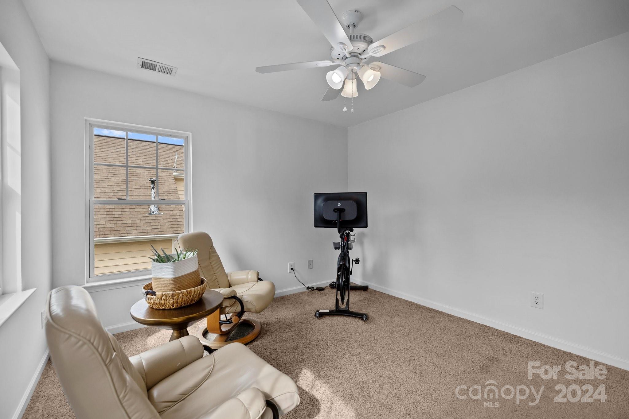 449 Silver Cypress Lane Fort Mill, SC 29708 - Photo 31 of 42 a view of a livingroom with workspace and a window