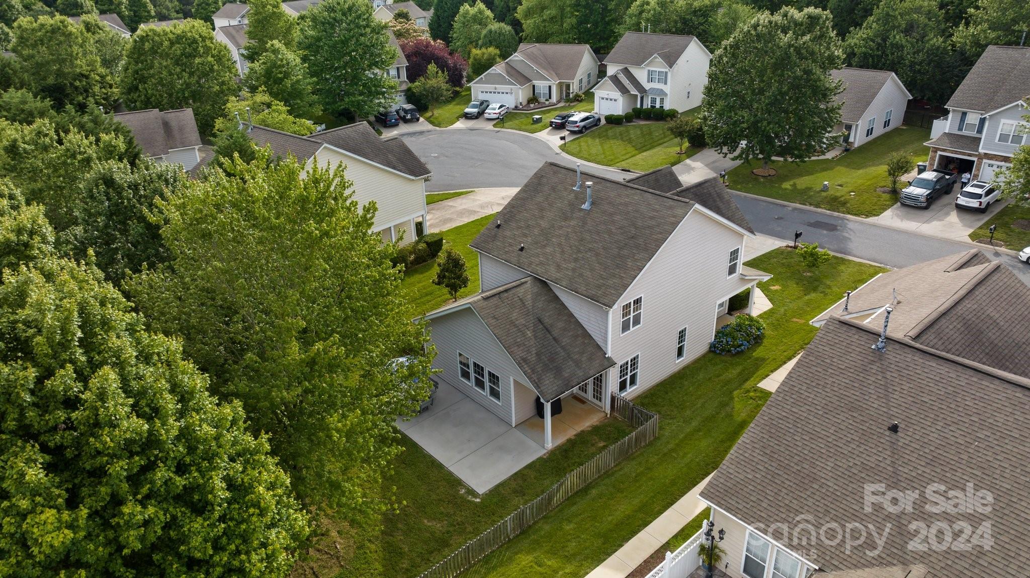 449 Silver Cypress Lane Fort Mill, SC 29708 - Photo 40 of 42 an aerial view of a house with a garden