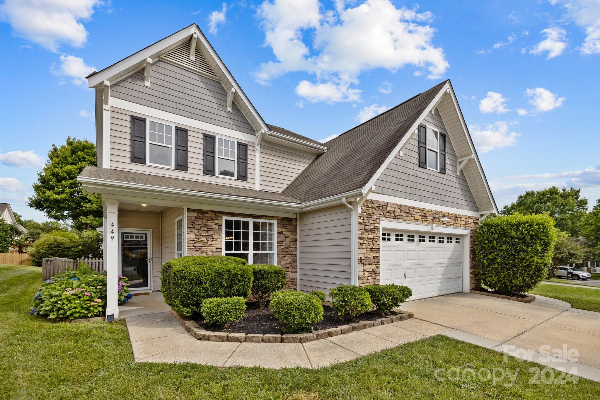 449 Silver Cypress Lane Fort Mill, SC 29708 - Photo 4 of 42 a front view of a house with a yard