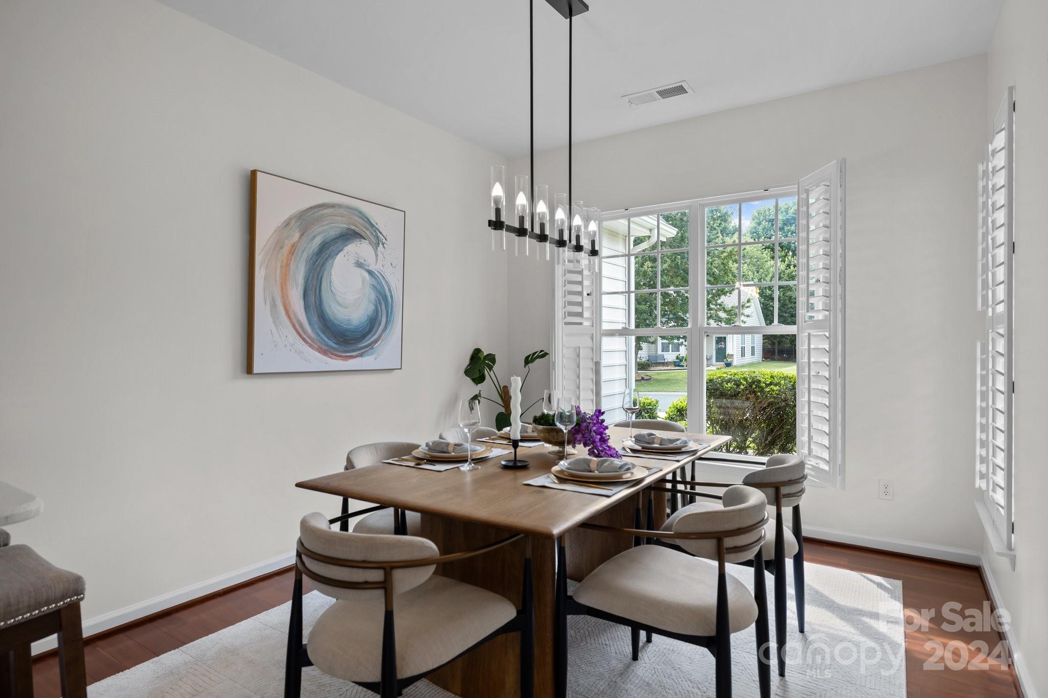 449 Silver Cypress Lane Fort Mill, SC 29708 - Photo 7 of 42 a view of a dining room with furniture window and outside view