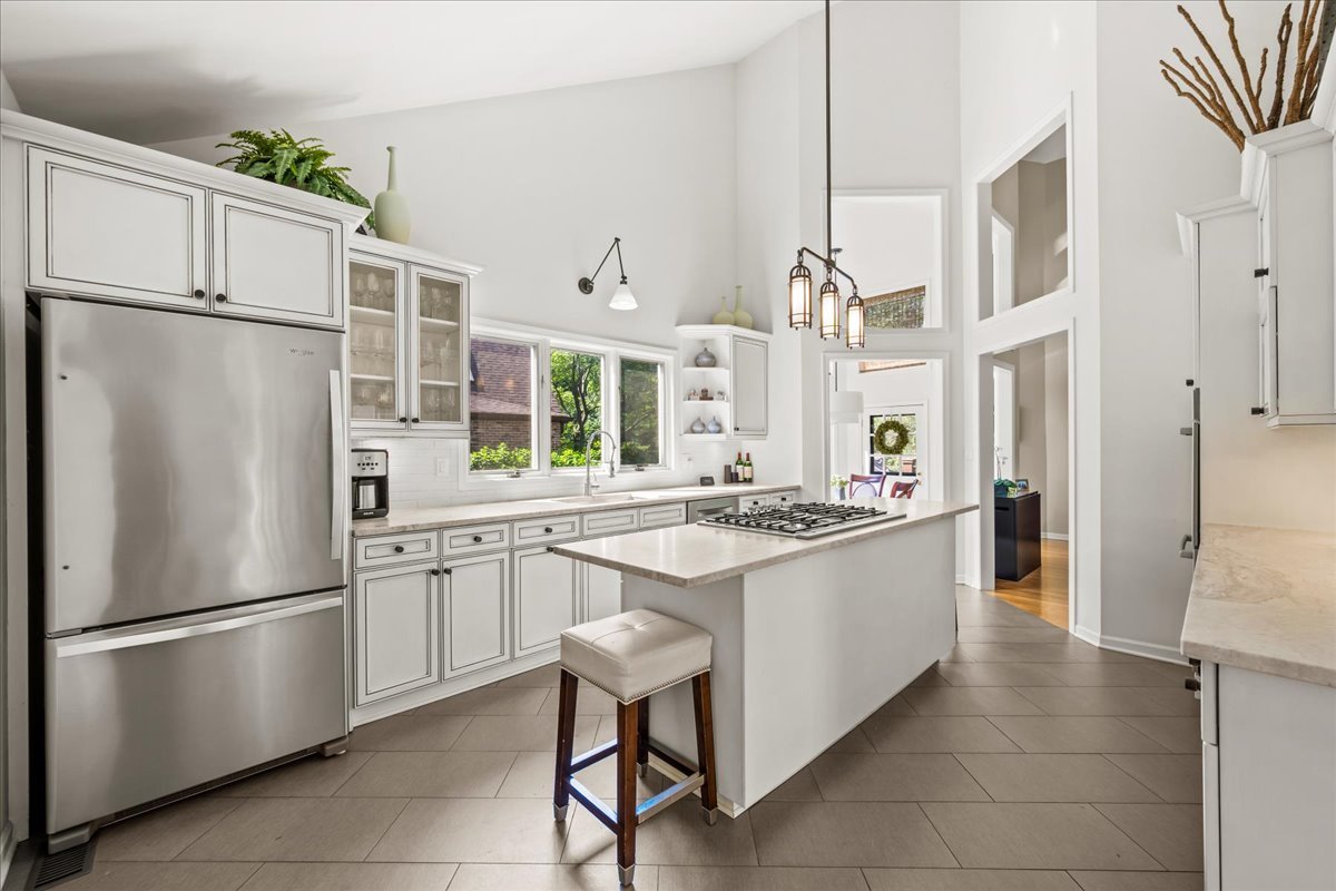 510 Buena Road Lake Forest, IL 60045 - Photo 12 of 40 a kitchen with stainless steel appliances a refrigerator sink and cabinets