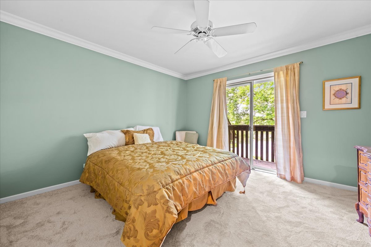 510 Buena Road Lake Forest, IL 60045 - Photo 25 of 40 a bedroom with a bed and a window