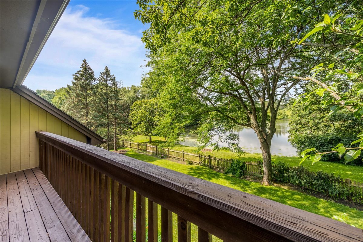 510 Buena Road Lake Forest, IL 60045 - Photo 26 of 40 a balcony with wooden floor and fence