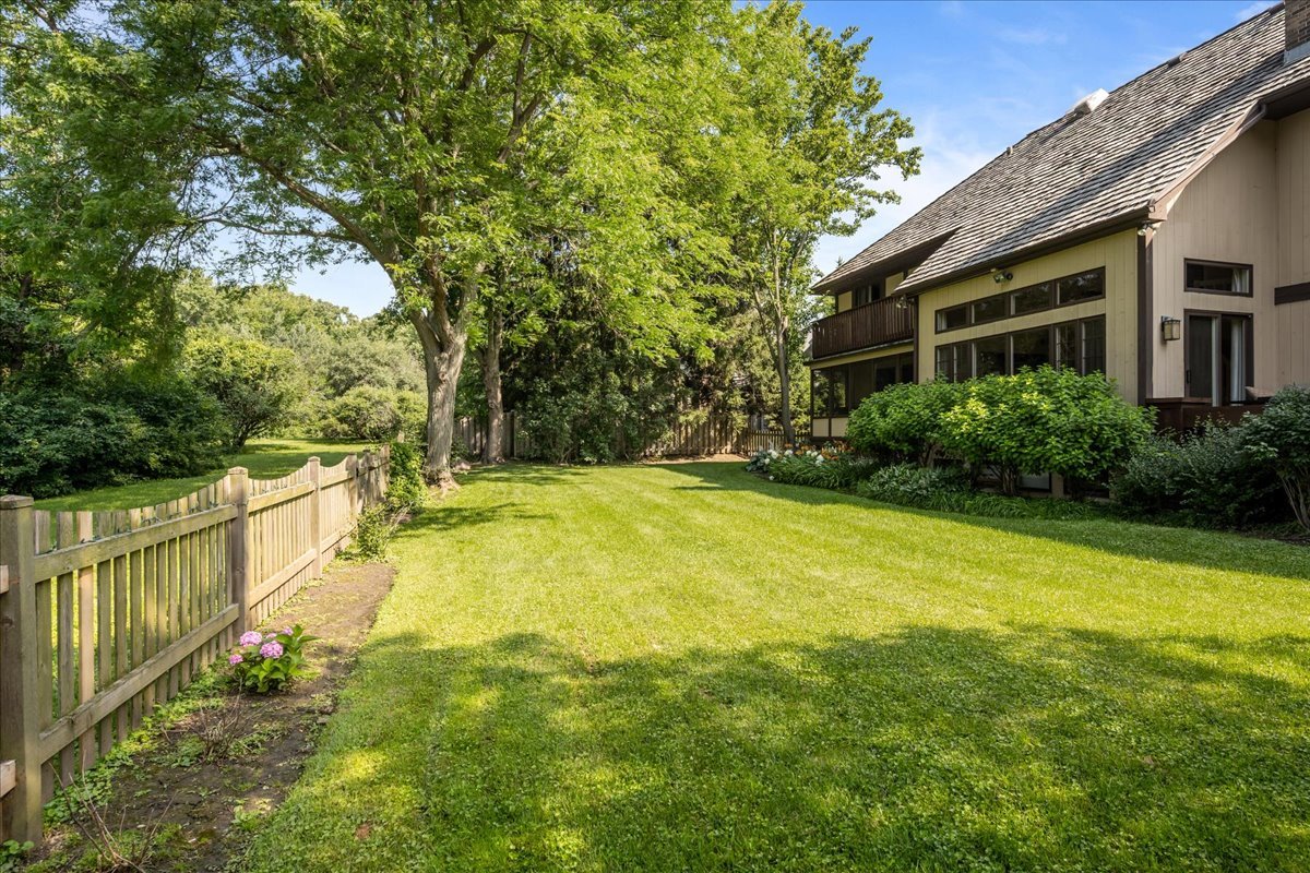 510 Buena Road Lake Forest, IL 60045 - Photo 34 of 40 a view of a house with pool and a yard
