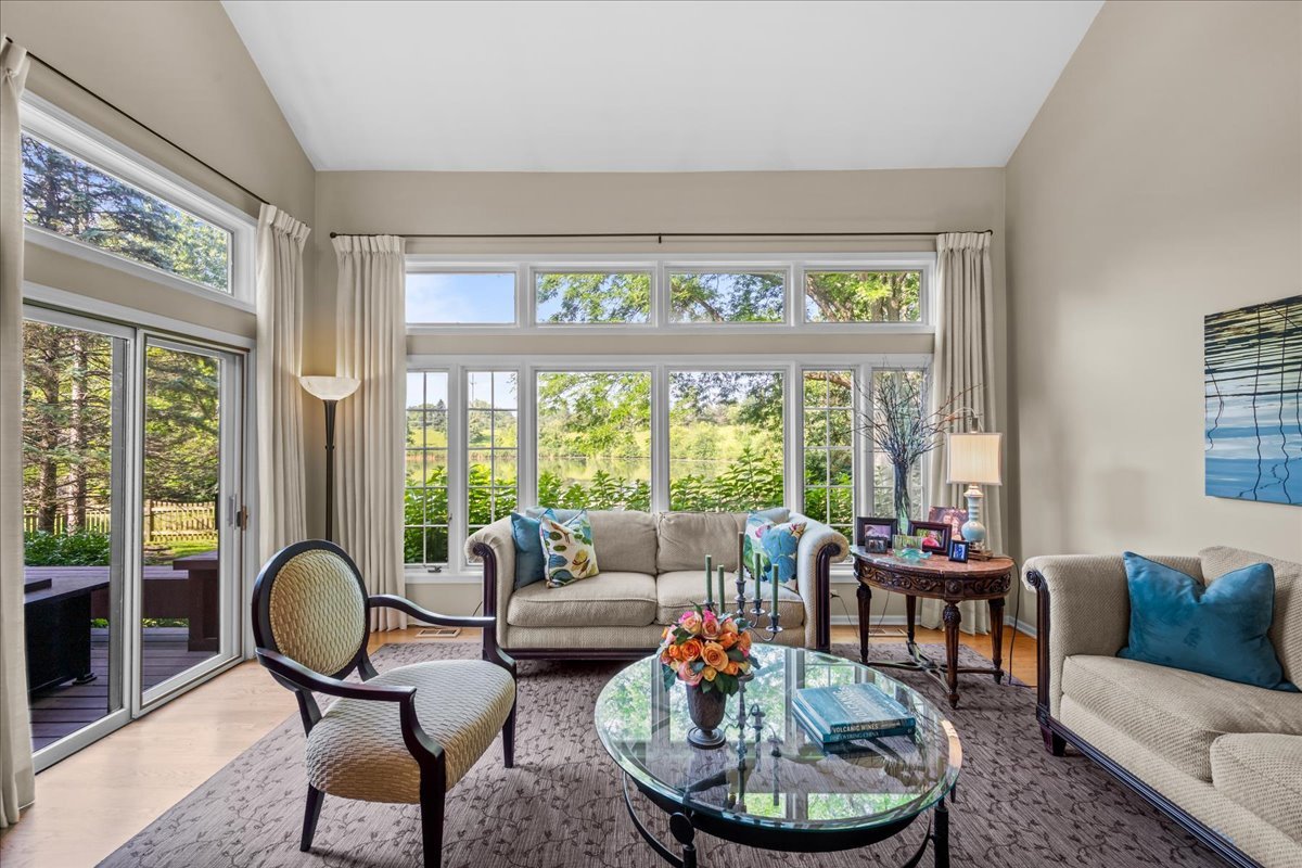 510 Buena Road Lake Forest, IL 60045 - Photo 5 of 40 a living room with furniture a rug and a large window