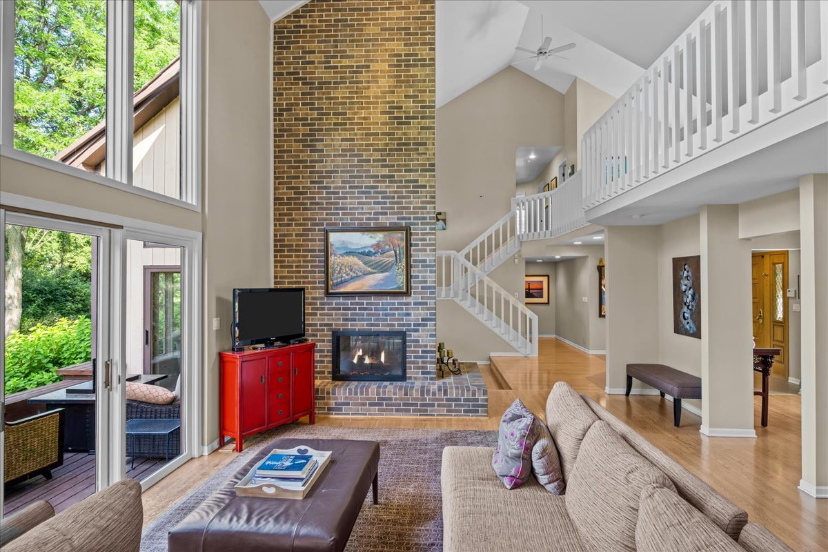 510 Buena Road Lake Forest, IL 60045 - Photo 7 of 40 a living room with fireplace furniture and a flat screen tv